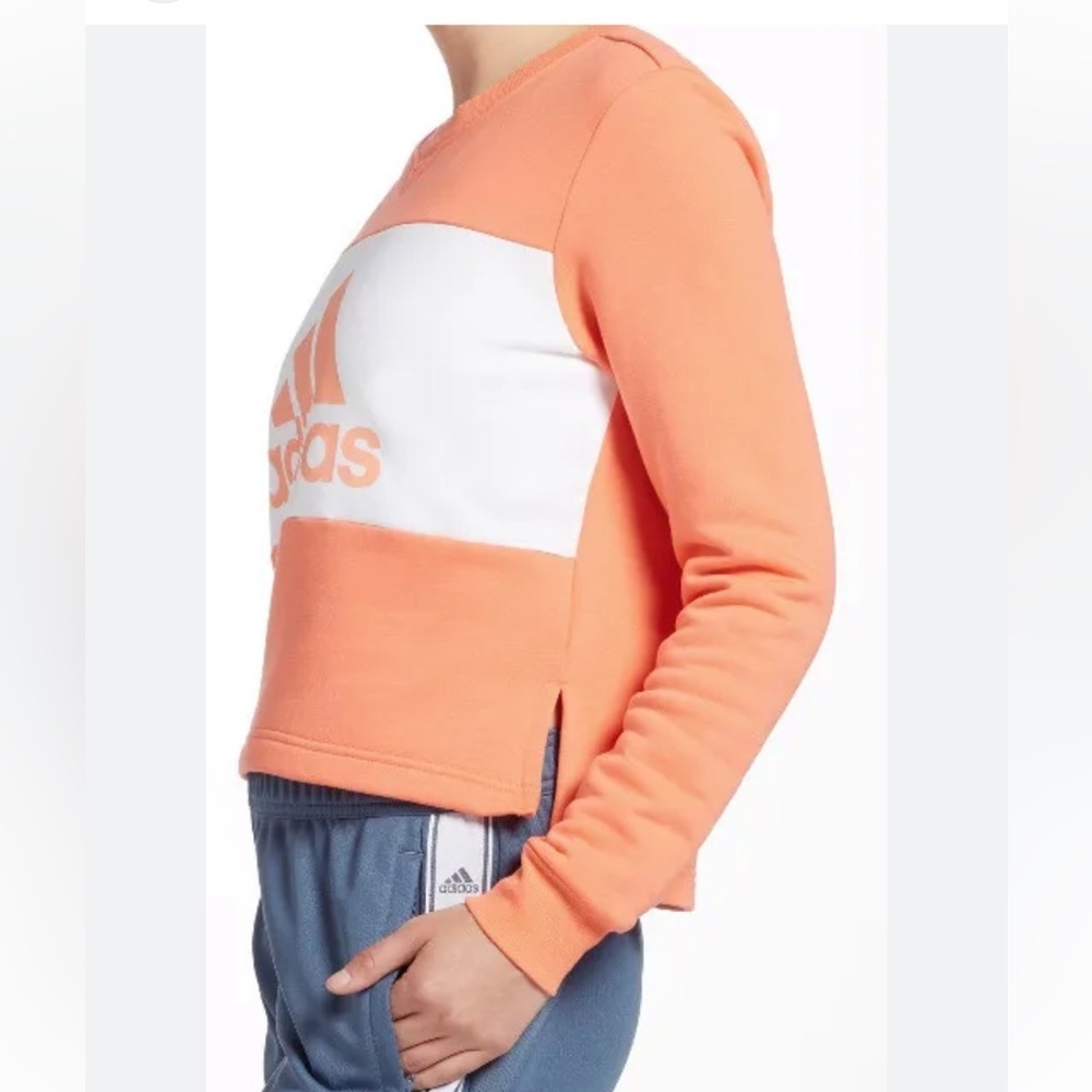 ADIDAS women’s postgame crew neck cropped front / longer back sweatshirt orange